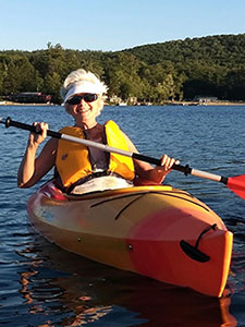 Ann on her kayak